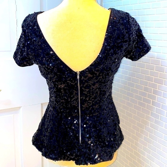 Casual Couture black sequin short sleeve peplum top. Back Zipper.Lined. Size M. - Picture 2 of 7